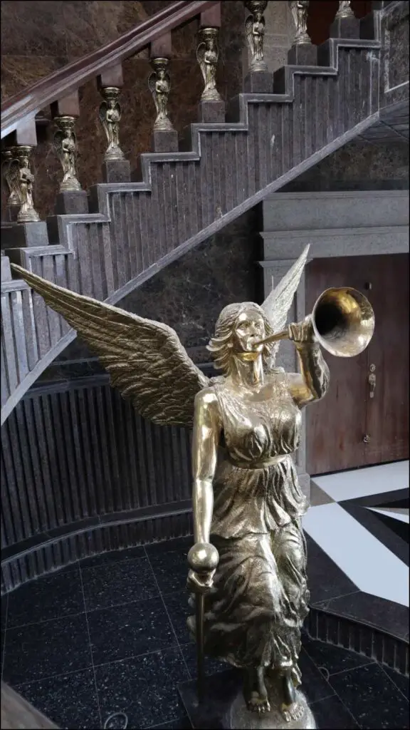 Trumpet blaring brass angel